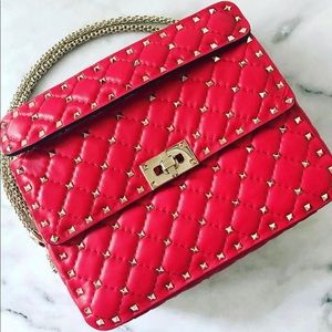 I used it only ONCE. It is like brand new. It is a fabulous iconic Valentino!